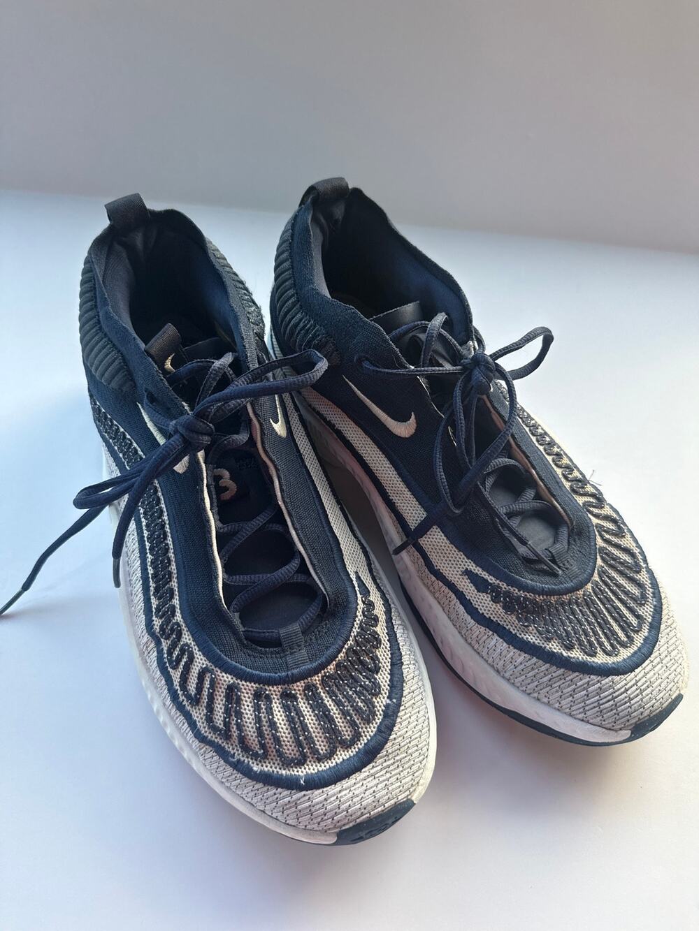 11.5 Nike men’s basketball shoes, blue and white worn one season only indoors